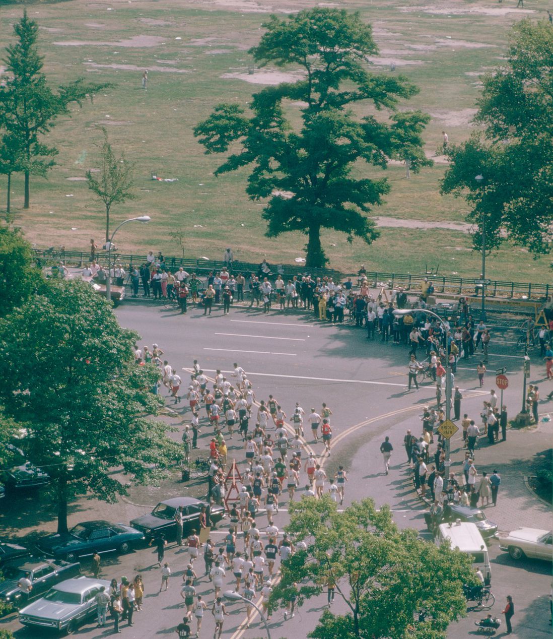 Runners in the first New York City Marathon turn onto Park Drive in Central Park, 1970. (Ruth Orkin/<a href="http://www.orkinphoto.com/">Ruth Orkin Photo Archive</a>)